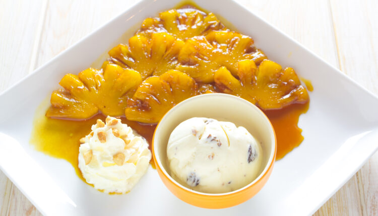 Pineapple,Fruit,Fritters,With,Ice,Cream,On,Wood,Table